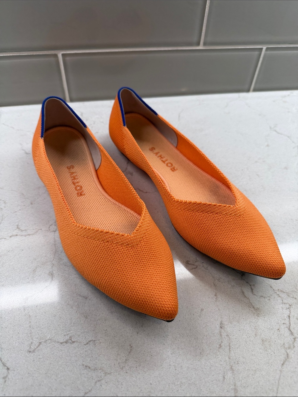Rothy's tangerine the Point Knit Flats with Blue Trim
